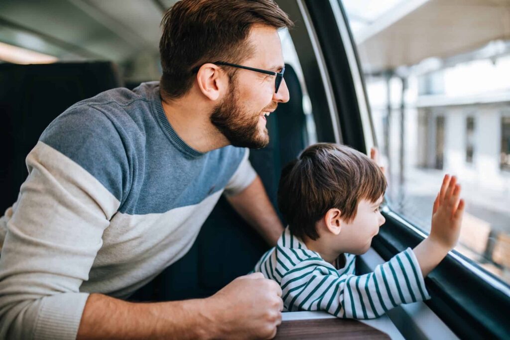 Dad and son on the train