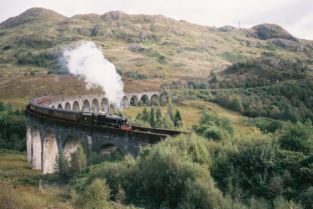 Viaduct in Scotland with steam train